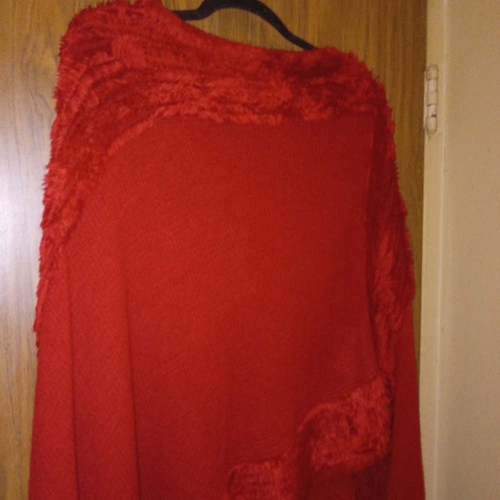 NEW PONCHO,SOFT FUZZY TASSELD DETAILING ON COLLAR AND BOTTOM,RED